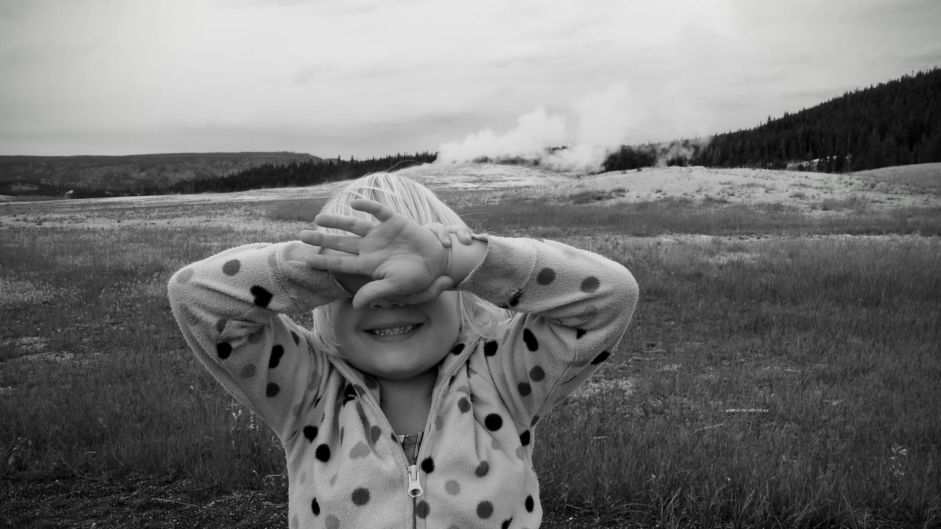Little girl at Old Faithful, Yellowstone National Park, circa 2013